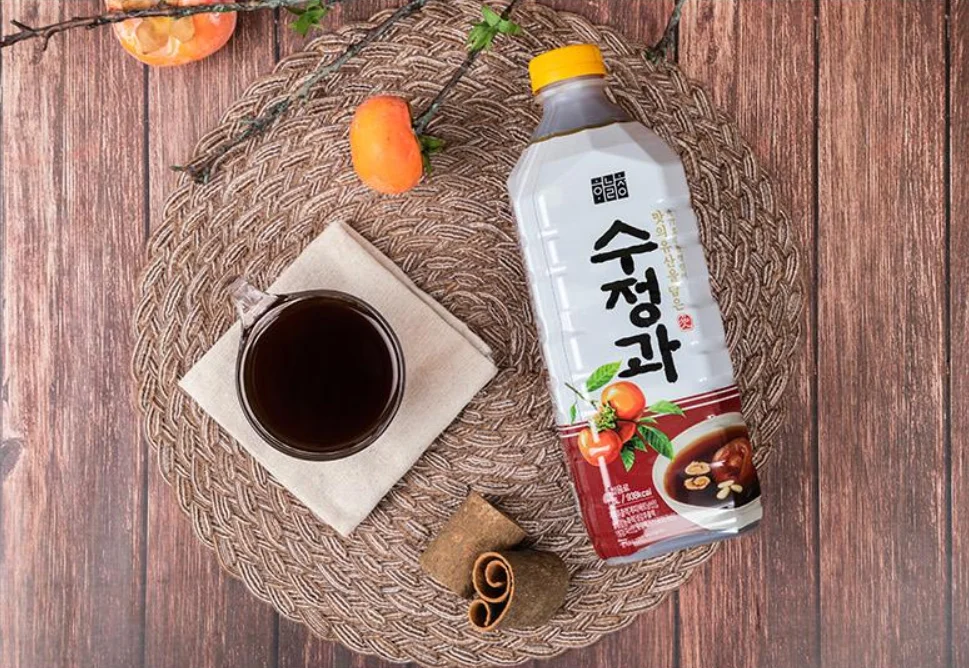 
Sweet sujeonggwa drink Korean traditional cinnamon punch beverage made with 100% domestic nut and malt syrup 