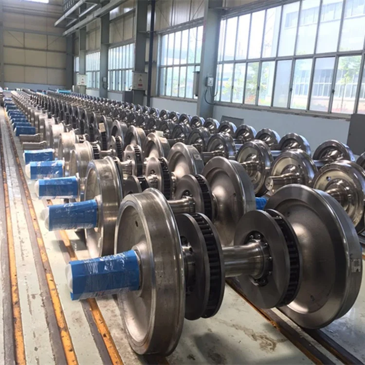 Train railway wheelset/wheel pair assembly including railway wheel and axle