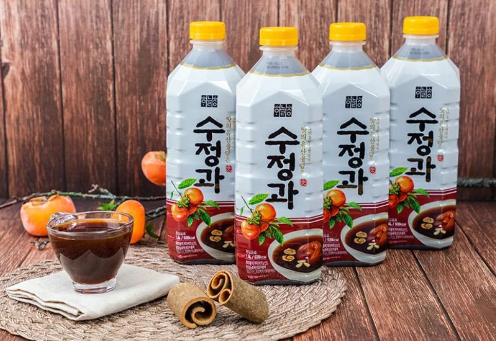 
Sweet sujeonggwa drink Korean traditional cinnamon punch beverage made with 100% domestic nut and malt syrup 