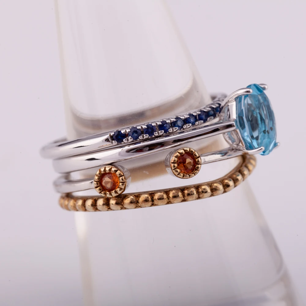 Stackable ring comes with 4 pieces silver 925 with natural blue topaz and orange sapphire and factory price