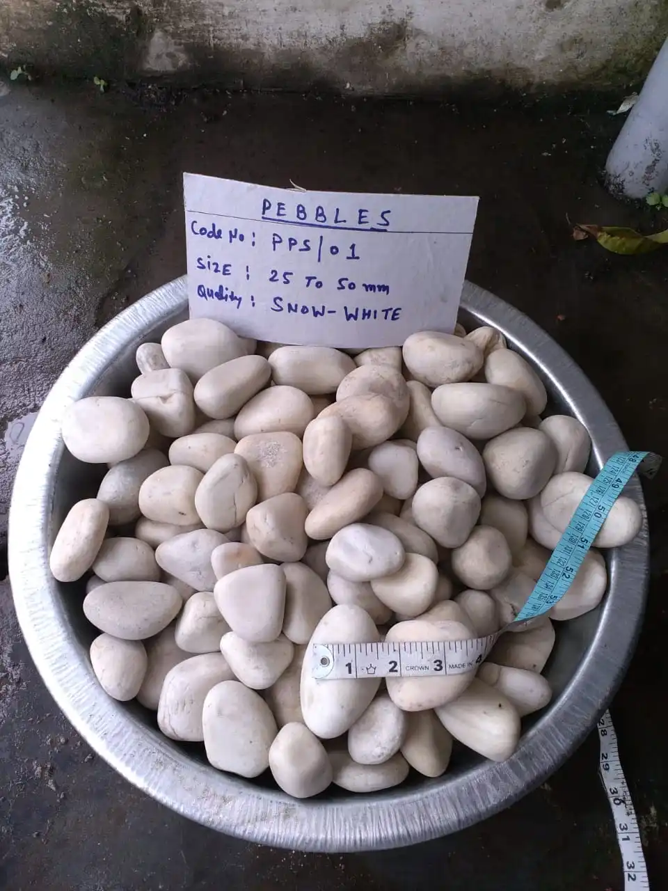 river cobbles and pebbles white tumble and rough rock stone for garden and exterior landscaping decoration used