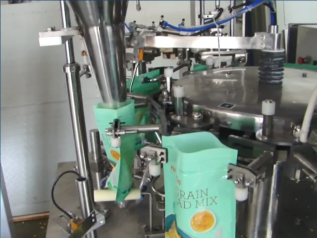 China Factory Seller Granule Pack Potato Chips Packaging Rotary Pre-made Bag Packing Machine