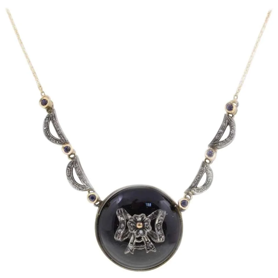 
Diamonds,Blue Sapphires,Onyx Rose Gold and Silver Pendant Necklace 
