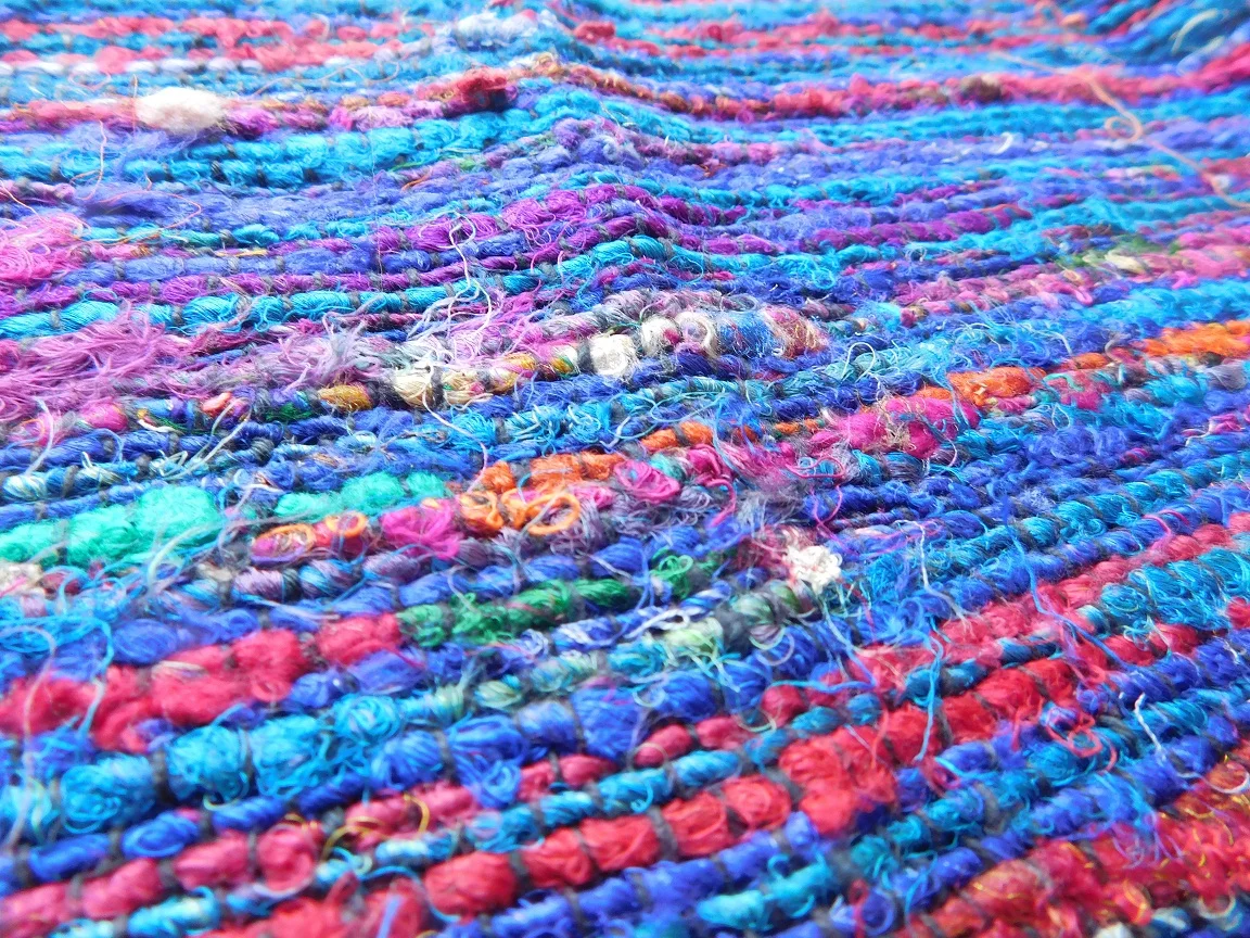 custom made multi colored recycled sari silk fabrics made from twisted sari yarns ideal for home textile stores