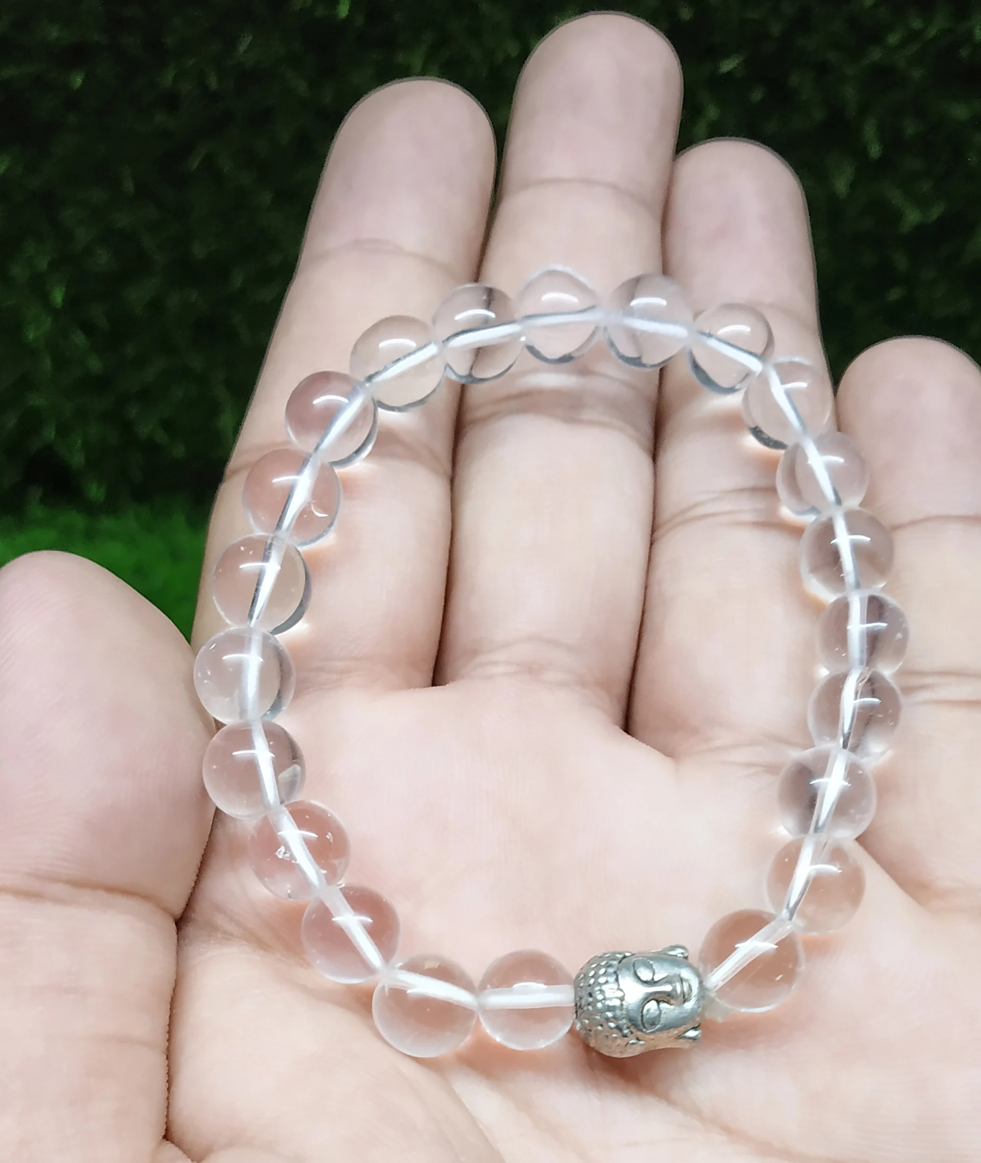Beautiful  Stretchable 8 mm Crystal Clear Quartz High Quality Bracelet With a Silver Buddha Head For Sale