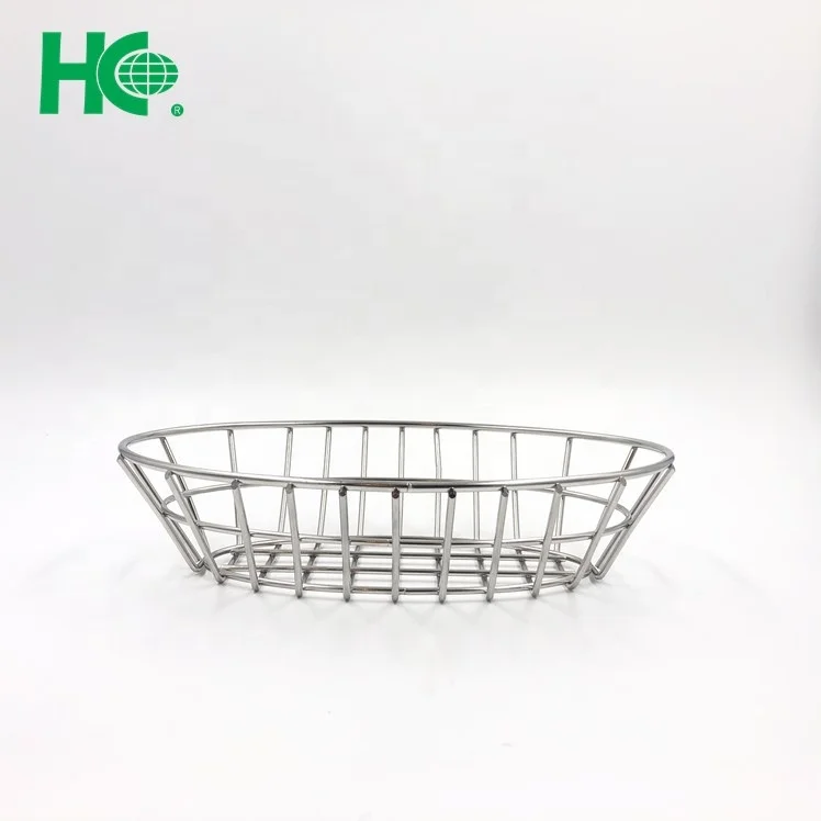 oval fast food restaurant serving metal bread basket