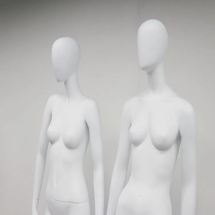 Abstract female full body white matte FRP manikin with egg head