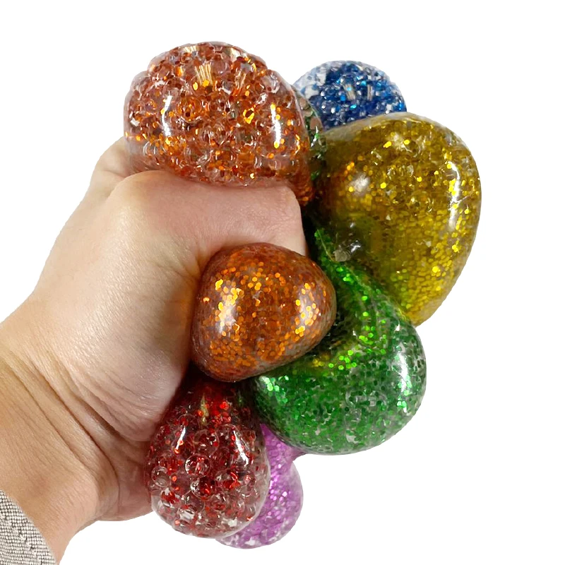 Hot Novelty Promotional Cute Sensory Ball Glitter Candy Small Capsule Stretchy Squeeze Drop Toy for Vending Machine