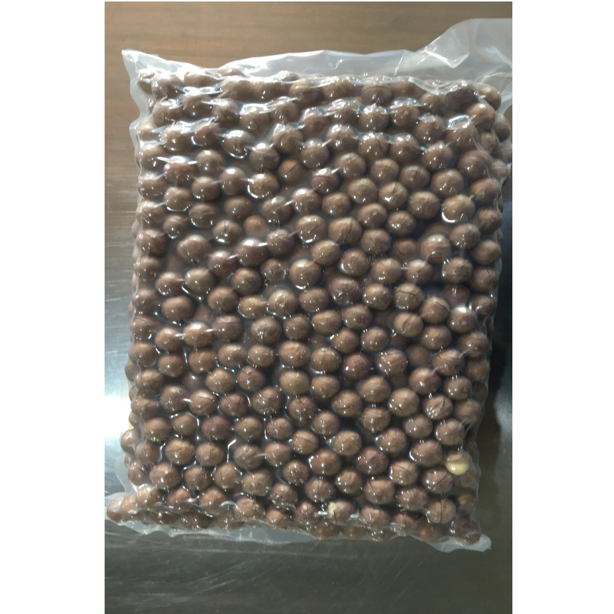 Bag Packing Dry Cracked in Shells Dried Style Organic Cultivation Type Macadamia nuts ( size 25+mm) from Vietnam