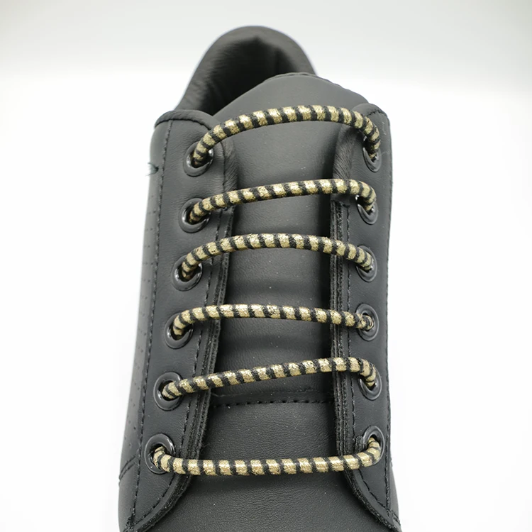  100% Rawhides производит кожаные шнурки для обуви с металлическим принтом