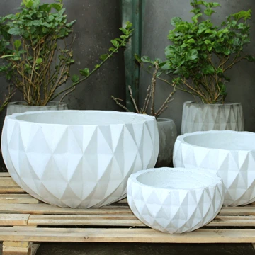 Set of 3 beautifully designed high quality concrete plant pots used to decorate your living space