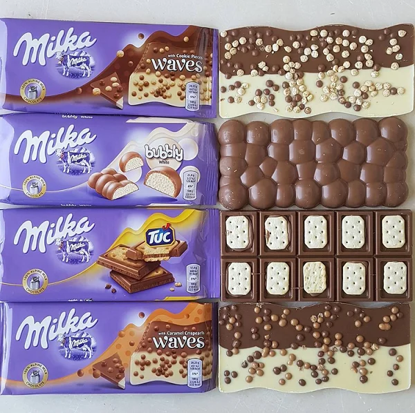 Молочный Крем с клубничным шоколадом Milka Bar