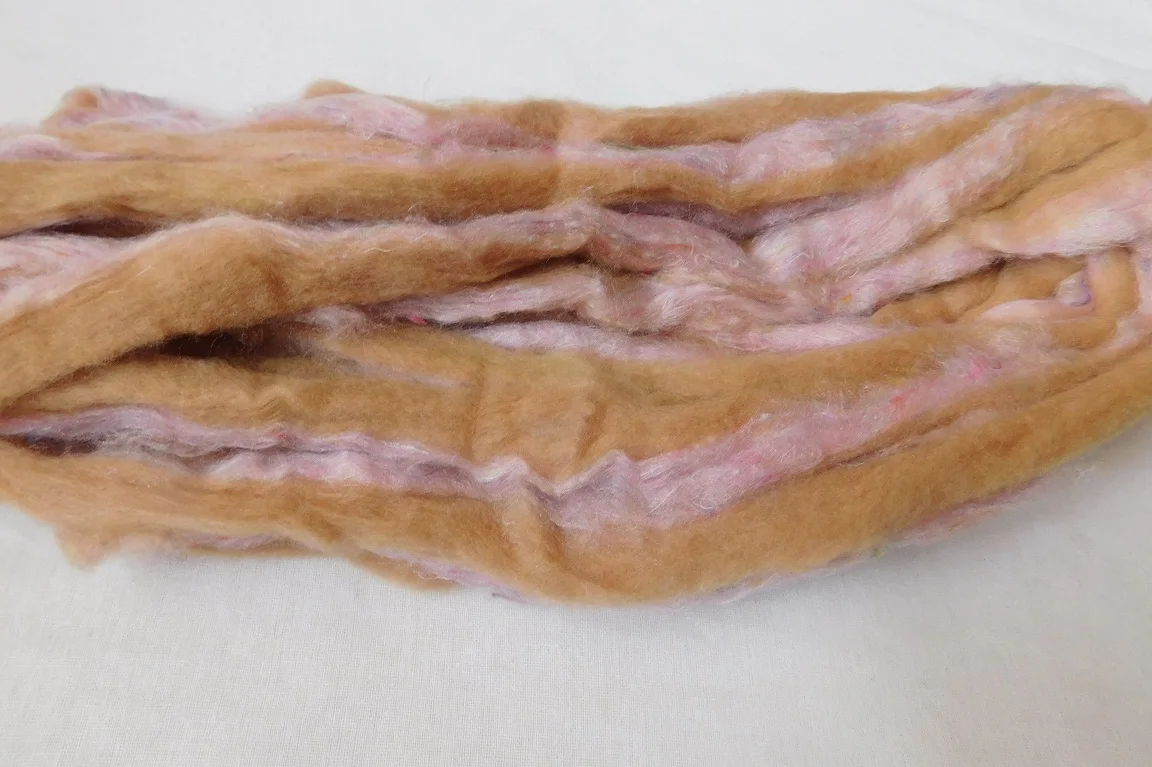 sari silk roving in two tone custom dyed colors suitable for yarn and fiber stores made from recycled silk fiber