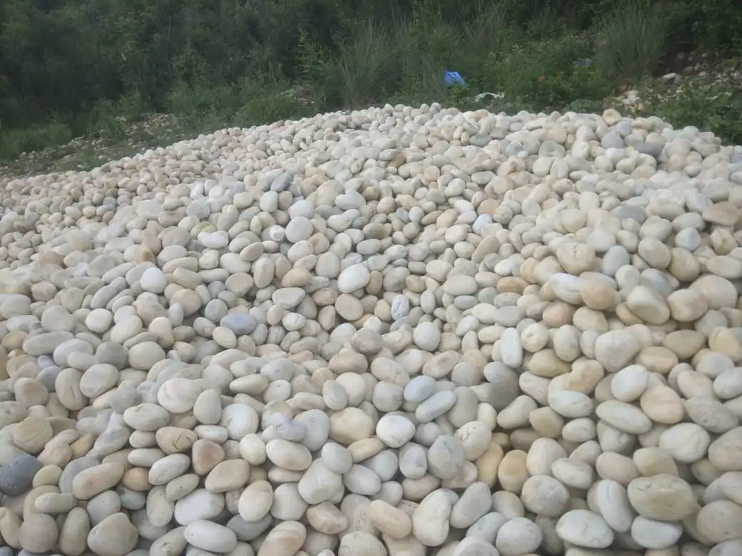 river cobbles and pebbles white tumble and rough rock stone for garden and exterior landscaping decoration used