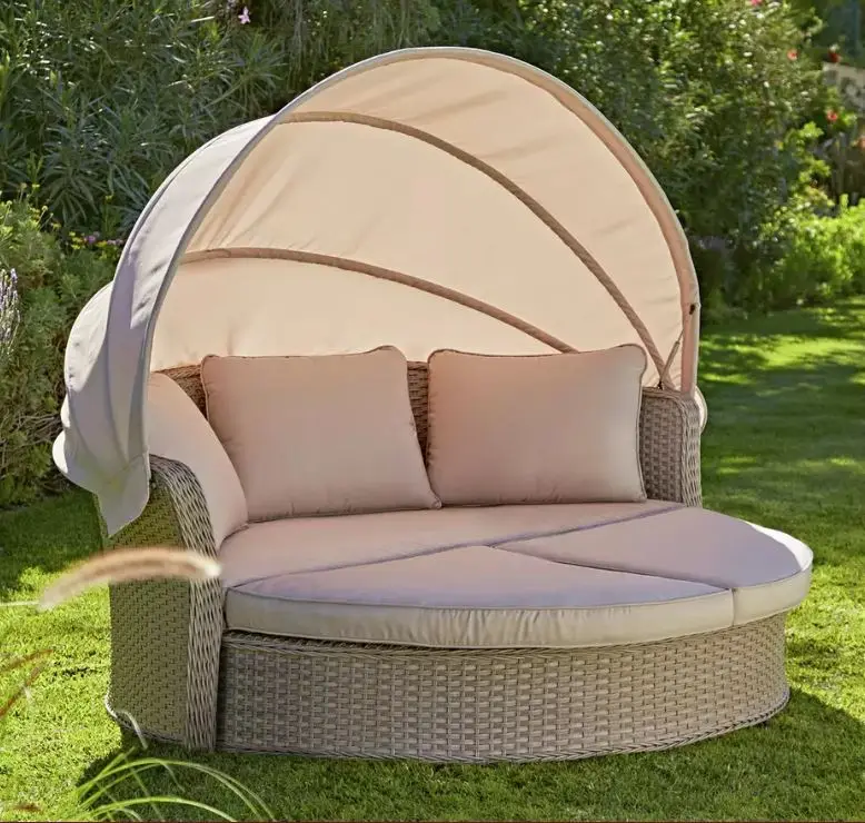 Rattan-day-bed-with-canopy-and-neutral-coloured-cushions-from-argos.co_.uk_.jpg