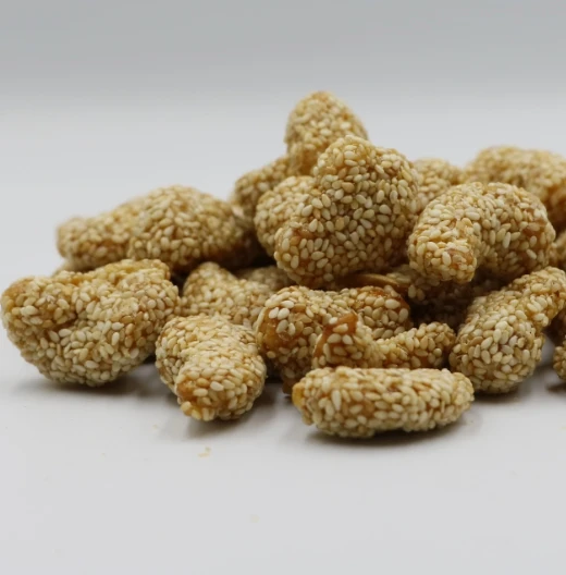 Premium White Sesame Coating Crispy Sweet Roasted Dried Cashew Nuts By Hola with COMMON Cultivation Type
