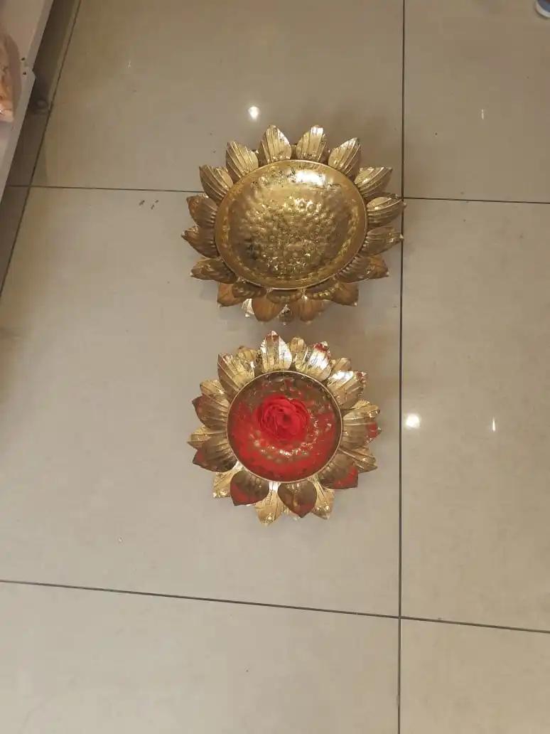 Iron platter in gold colour with design of line on lotus leaves and multiple shades of colour Diwali item new designee