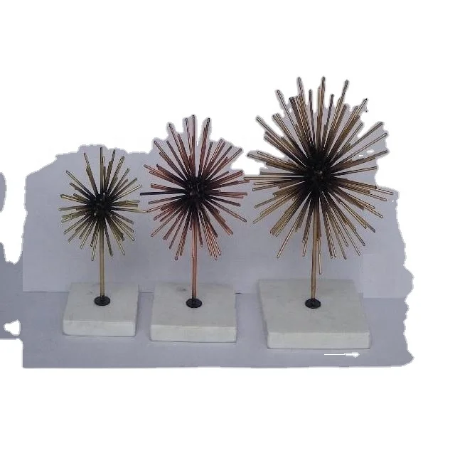 
Iron starburst sculpture in two tone with Marble stand 