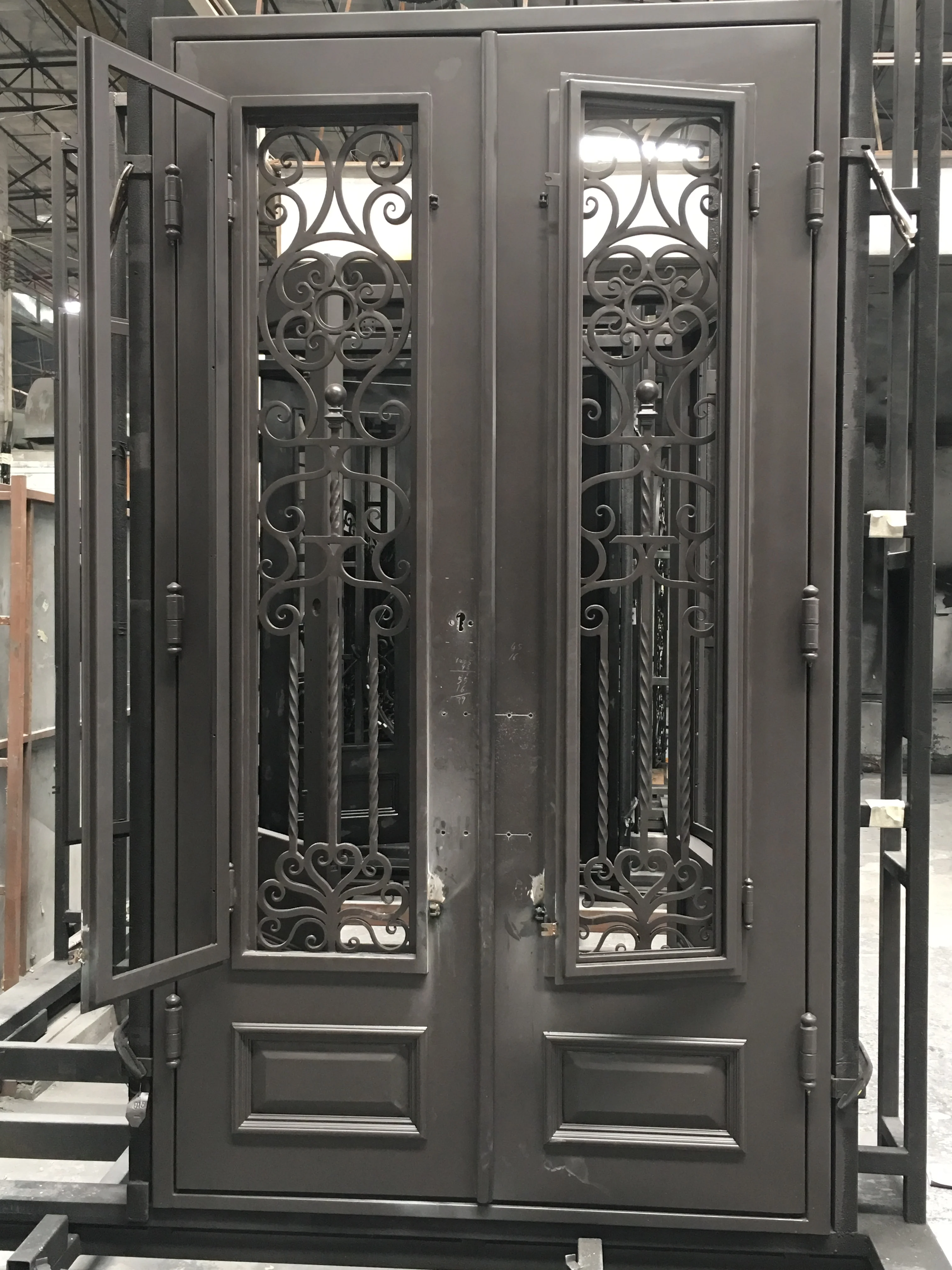 arched double wrought single iron entry doors
