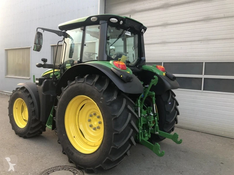 Купить б/у сельскохозяйственный трактор John Deere 6120 м на