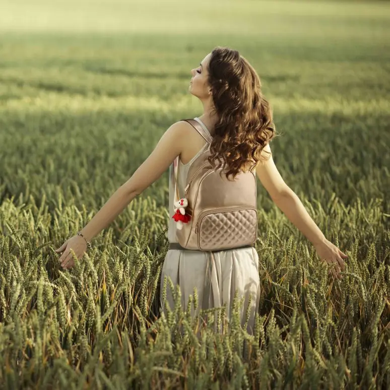 
Gold Backpack Rucksack With Bag Charm stylish backpack has a lined and spacious interior 