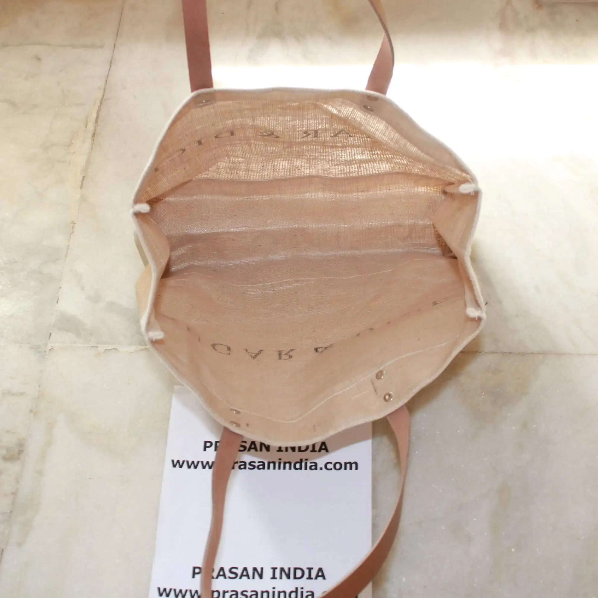 Jute Bag from India with pure leather straps which are easy to carry and gives premium looks