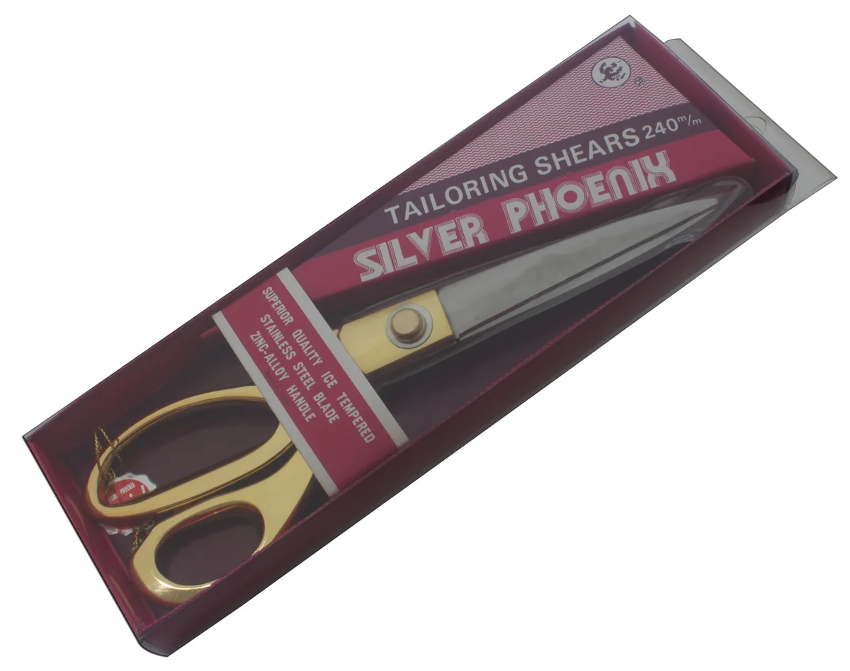 Золотые портновские ножницы