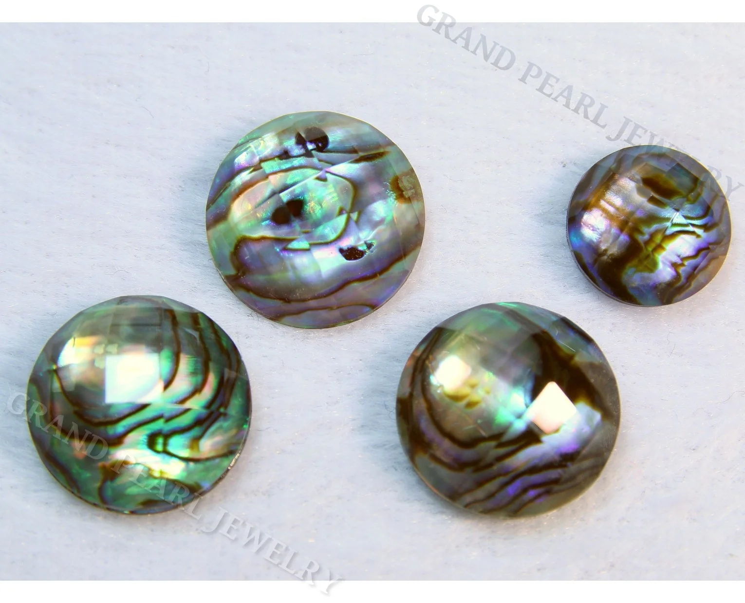 
Doublet Gemstone Cabochon - Paua Shell combined with faceted crystal - 12mm Round 