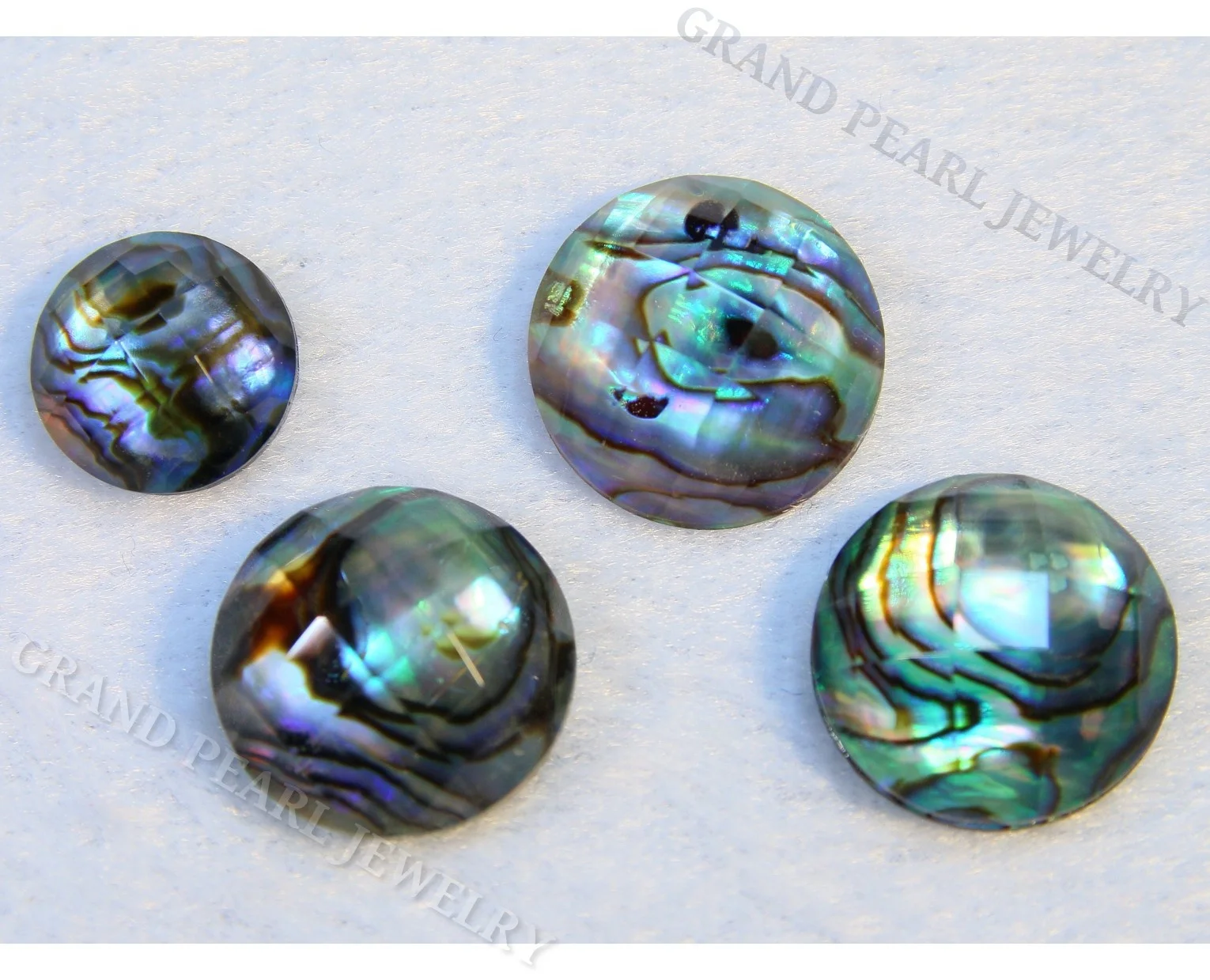 
Doublet Gemstone Cabochon - Paua Shell combined with faceted crystal - 12mm Round 