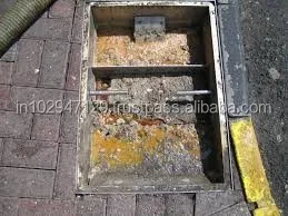Enzymatic treatment product to prevent vacuum pumping of solid wastes in septic tank systems
