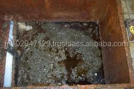 Enzymatic treatment product to prevent vacuum pumping of solid wastes in septic tank systems
