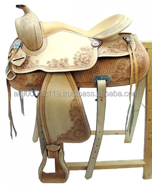 Western treeless saddle Hand tooled and carved