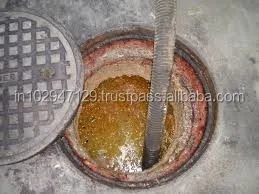 Enzymatic treatment product to prevent vacuum pumping of solid wastes in septic tank systems