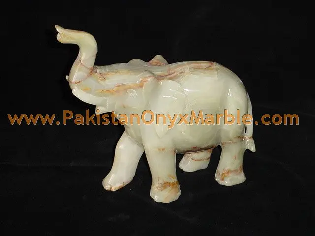 POLISHED ONYX HAND CARVED ELEPHANTS
