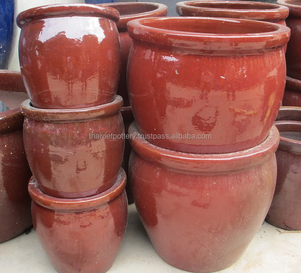 Glazed bright red pots