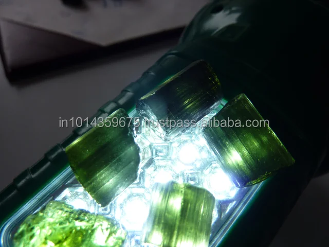 Драгоценный камень необработанный зеленый турмалин