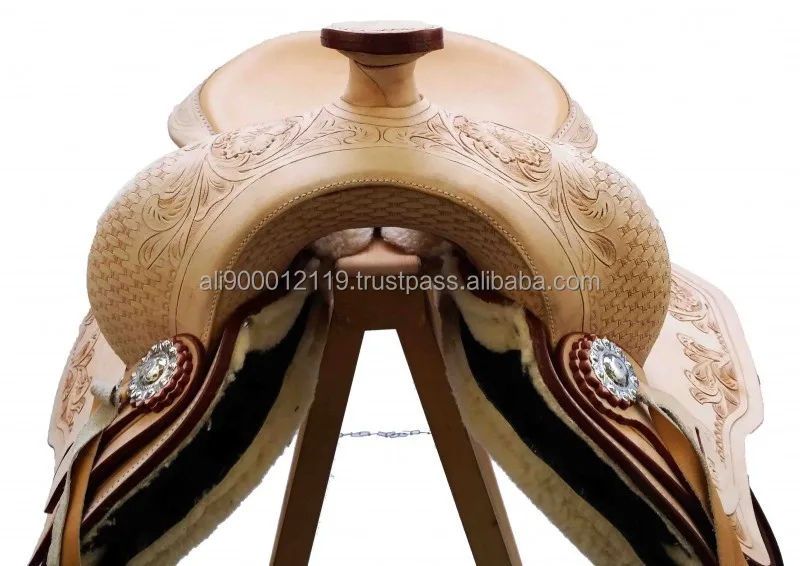 Western treeless saddle Hand tooled and carved