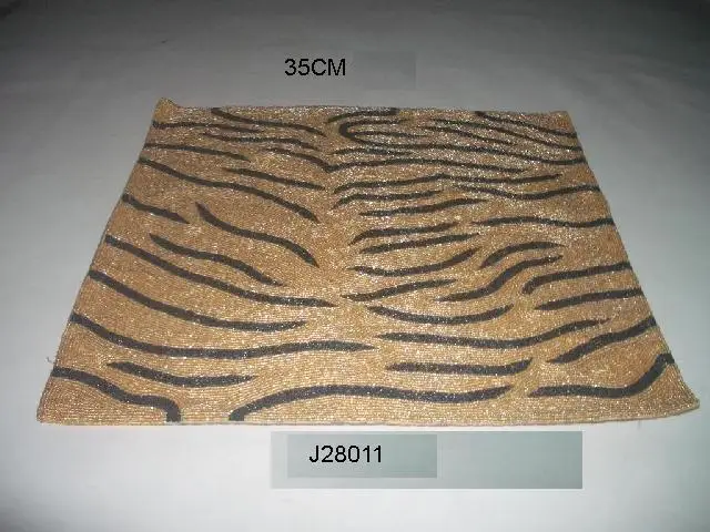 
Glass bead place mats with gold and black patterns other patterns available 