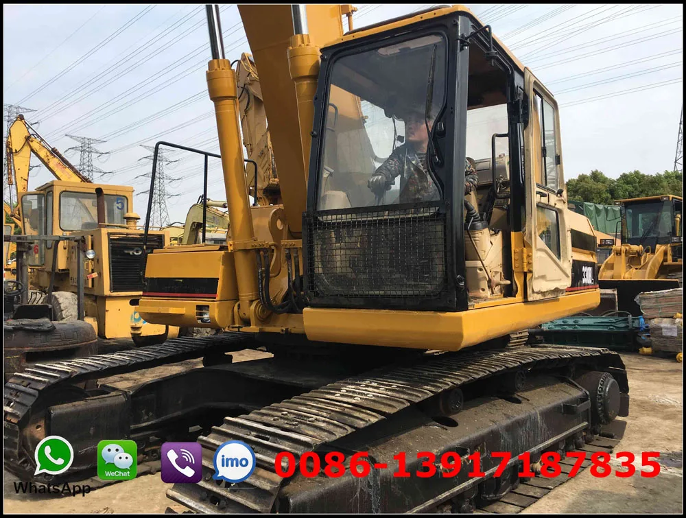 Used CAT 330BL excavator with jack hammer