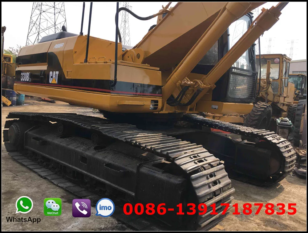 Used CAT 330BL excavator with jack hammer