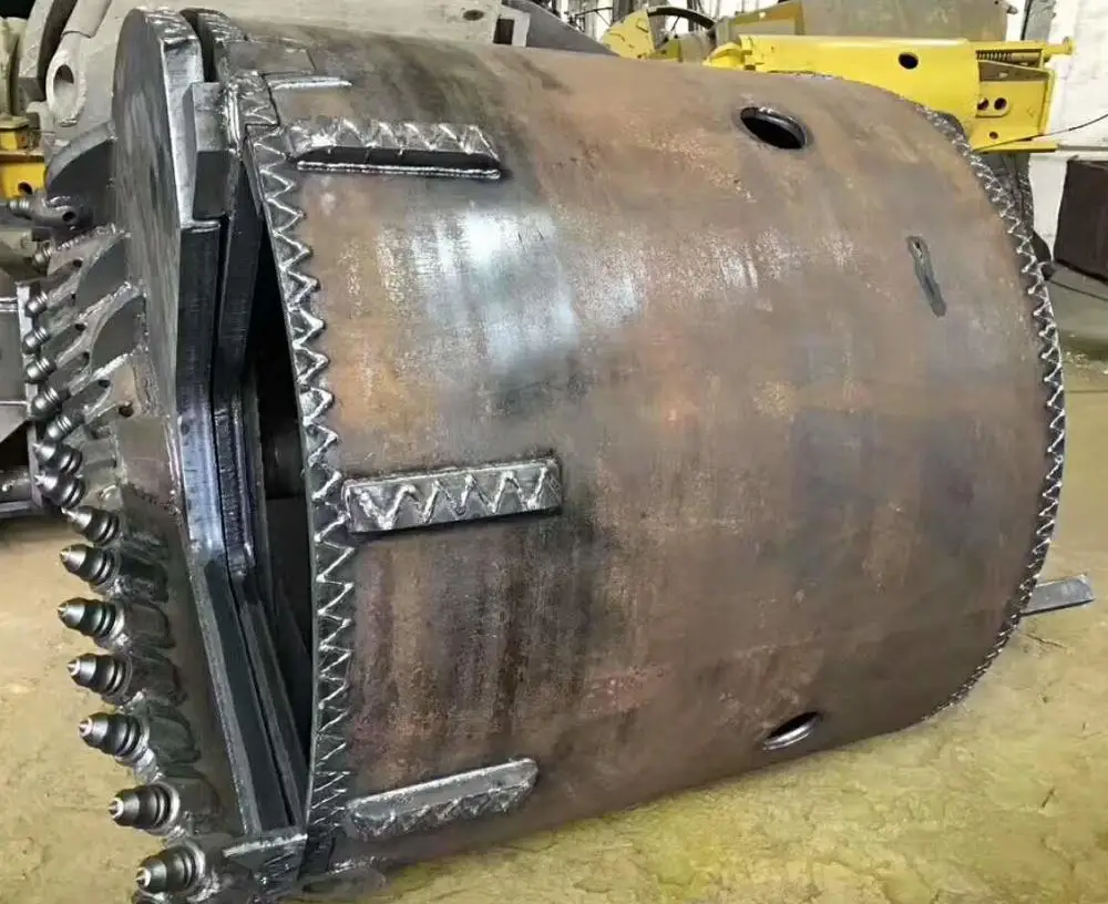 Double cutting door drilling bucket