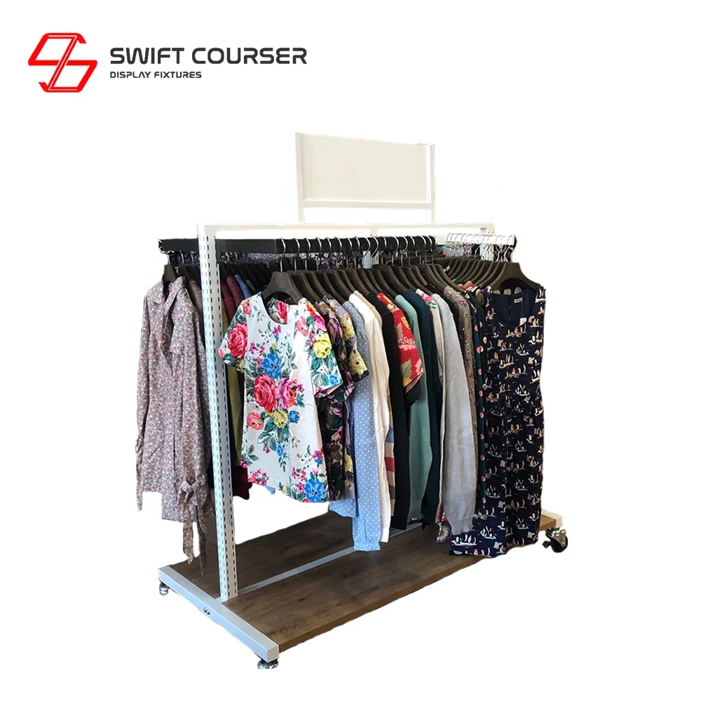 Modern portable clothing signs rack with clothes