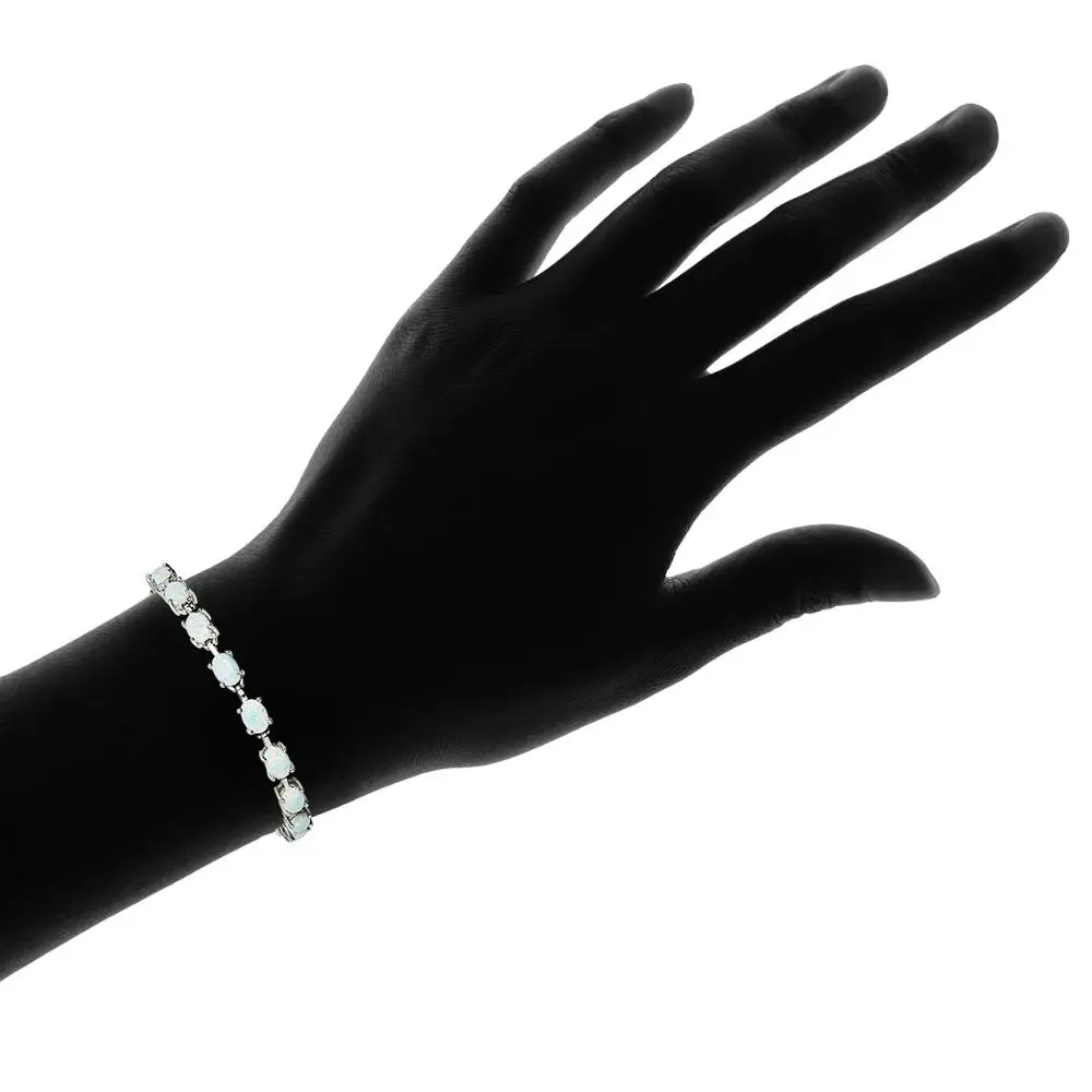 
925 Sterling Silver Simulated White Opal Oval-cut Tennis Bracelet 