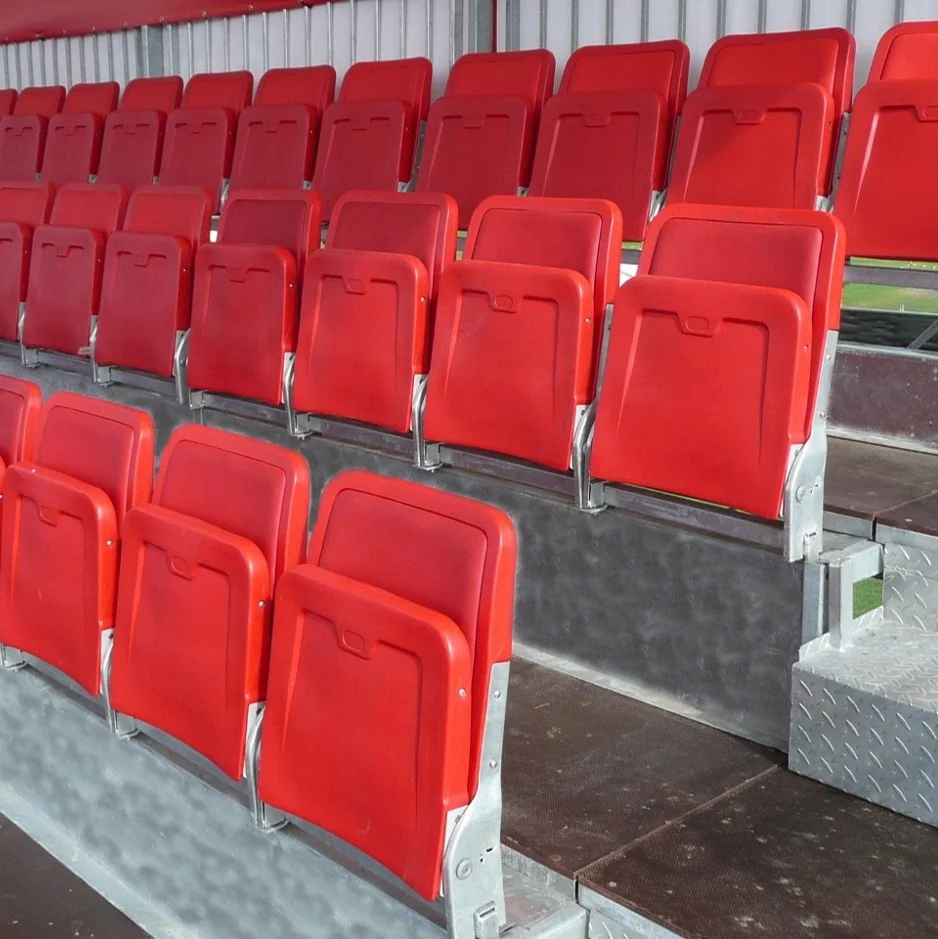 Plastic folding chair install with floor mounted stadium seating furniture