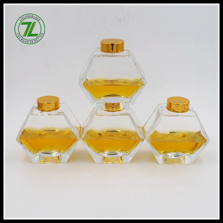 wholesale cheap 250ml honeycomb frosco vidrio hexagon polygon glass bottle honey bee glass jar with gold screw lid 8oz