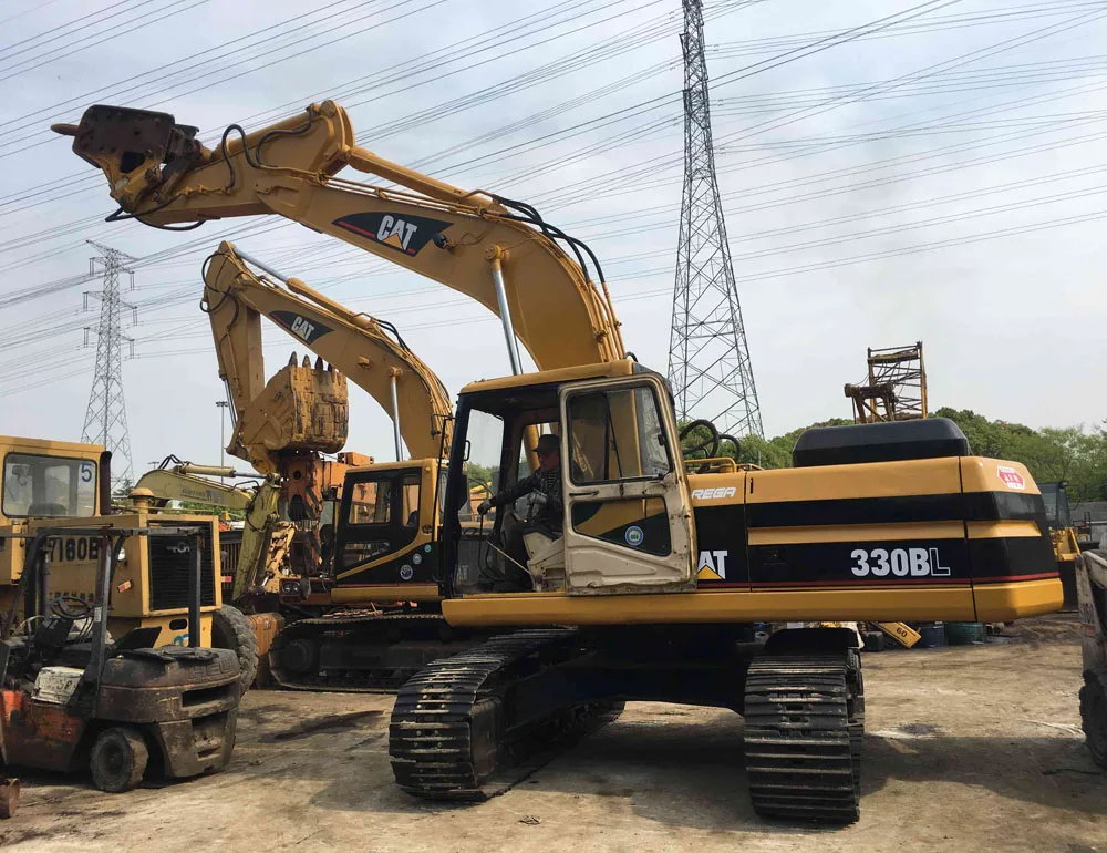 Used CAT 330BL excavator with jack hammer
