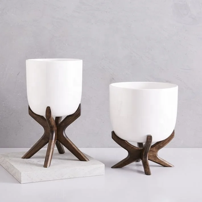 Set Pure White Ceramic Planters It will look great around your home as well as making beautiful centre piece