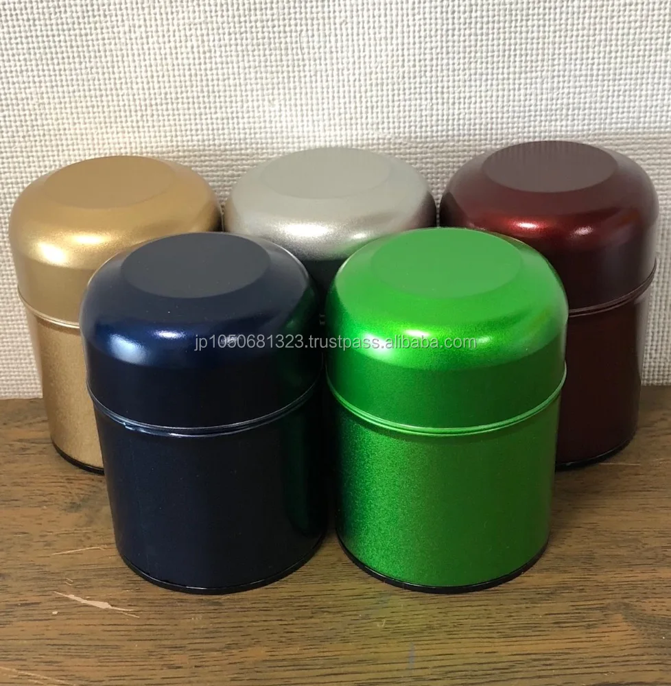 Round metal tin can with many different matte tea canister