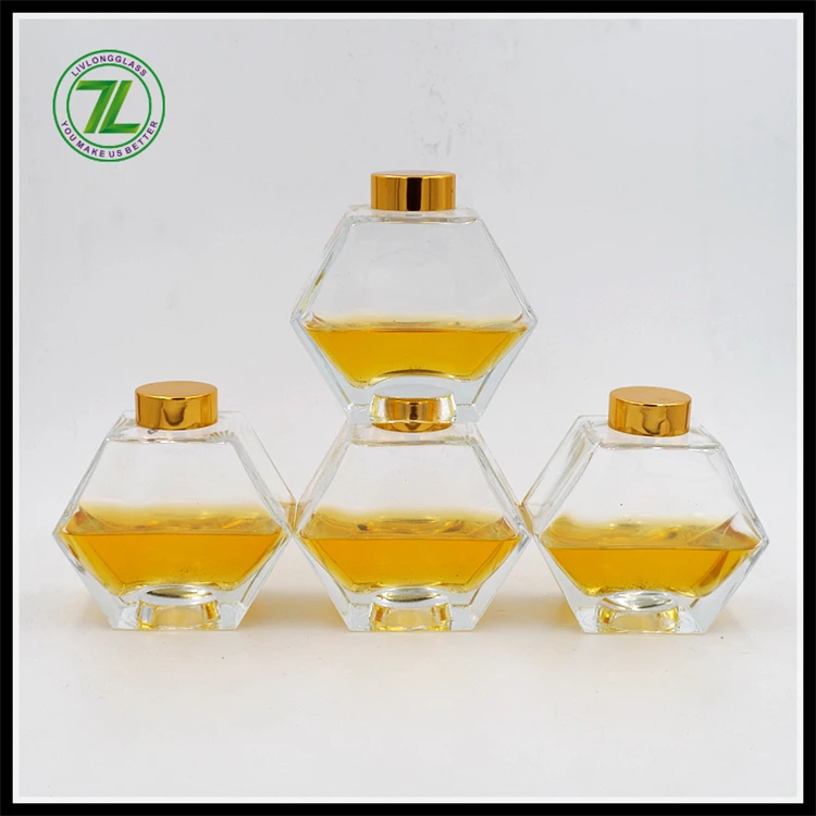 wholesale cheap 250ml honeycomb frosco vidrio hexagon polygon glass bottle honey bee glass jar with gold screw lid 8oz