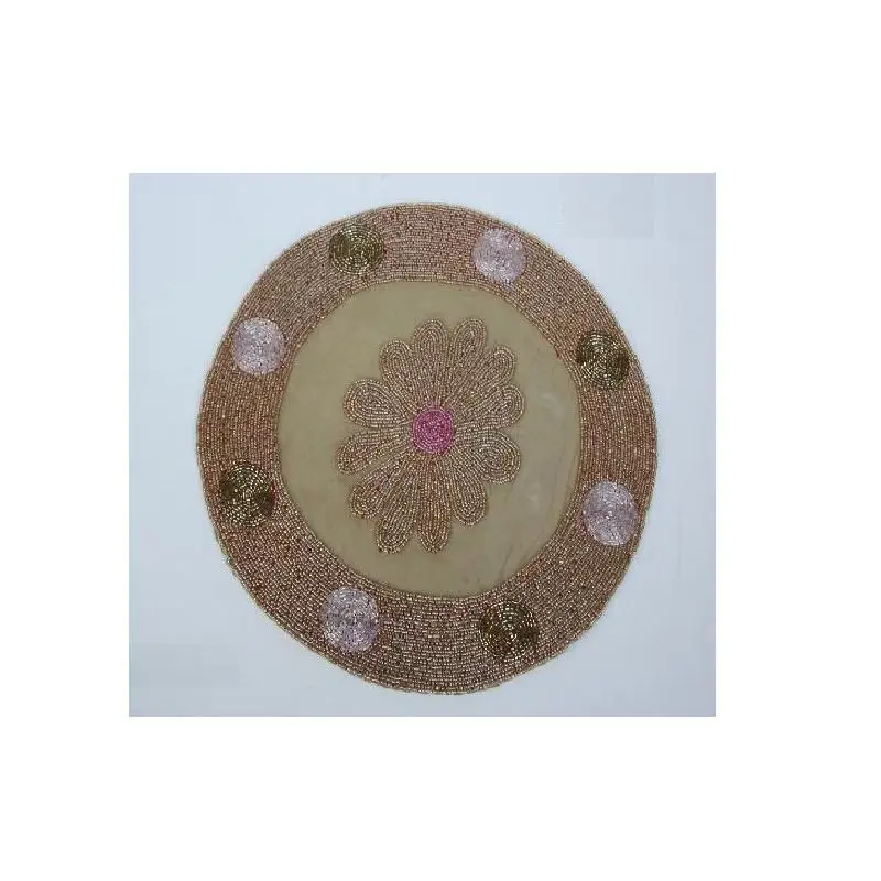 
Glass bead place mats with floral patterns on brown base glass beads other patterns available 